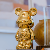 Urso Decorativo Lumi Dourado – 27 x 15 cm